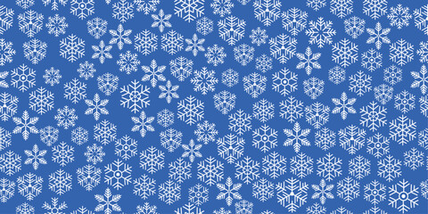 Poster - Snowflakes background. Vector seamless pattern dotted with snowflakes. Christmas background with large snowflakes.