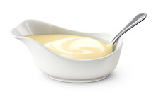 White Sauceboat With Condensed Milk And Spoon. Cut Out On Transparent