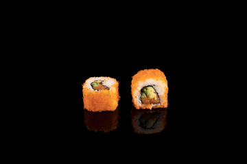 Wall Mural - Delicious rolls of Japanese cuisine. Dark background