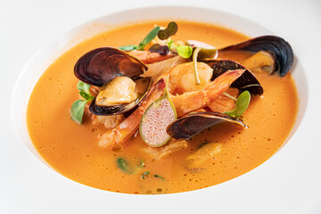 Wall Mural - seafood soup in the white plate