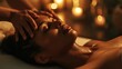 A woman receiving a relaxing facial massage at a spa. Perfect for promoting self-care and wellness