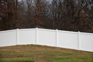 white vinyl fence in residential neighborhood home nature plastic new