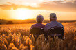 Old grandmother and grandfather, grandparents, grandma amd grandpa on a wheelchair look at sunset. pensioners retirees senor and senorita happy sad old age.