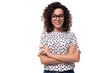 © Ivan Traimak - young confident leader woman with curly hairstyle dressed in summer short sleeve blouse