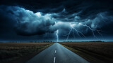 Fototapeta Fototapety z naturą - Empty asphalt road towards dramatic dark cloudy and stormy sky.Storm clouds and distant lightning strikes over the road, 
