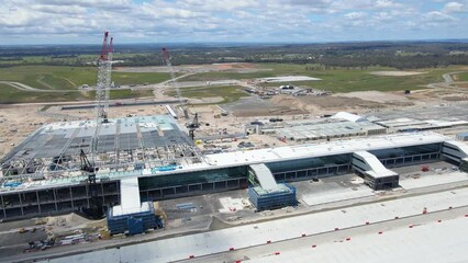 Wall Mural - Aerial drone view of the construction site of the new Western Sydney International Airport at Badgerys Creek in Western Sydney, NSW Australia on a sunny day shot on 23 December 2023  