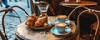 petit déjeuner parisien typique avec croissant et café sur une table de bistrot