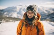 Girl snowboarder in stylish wear and protective glasses enjoy ski resort. Beautiful woman with ski helmet. Winter extreme sport, hobby. Weekend trip and relax concept