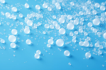 Wall Mural - blue background with various sized beads scattered all over.
