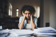 Deadline Dilemma: Image of a Stressed Young Woman at a Desk Overflowing with Documents