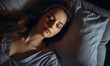 © JQM - Overhead shot of a woman sleeping comfortably, bed advertisement material, promoting restful sleep