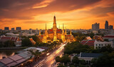 Fototapeta  - Grand Palace and Wat Phra Kaew Glowing in the Asian Sunset - A Landmark in Bangkok, Thailand.