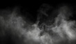 © Riz - Abstract powder or smoke effect isolated on black background