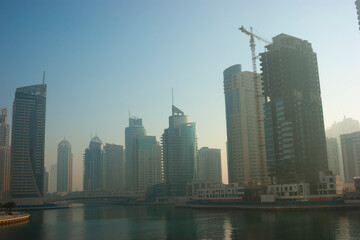 Canvas Print -  High rise buildings and streets in Dubai, UAE