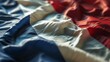 Flag of France. Closeup beautifully folded French tricolor made of fabric