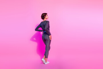 Poster - Full length photo of slim shiny lady wear glamour overall looking empty space isolated pink color background