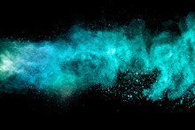 Abstract Multicolored Powder Explosion On Black Background. Red And Blue Dust Particles Splattered On Background.