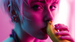 Seductive woman kissing a banana in suggestive way