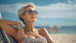 © Natalia Klenova - Smiling mature woman at the beach, natural lifestyle