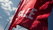 Red flag with the inscription Sale on the sky background. Season of sales and discounts.