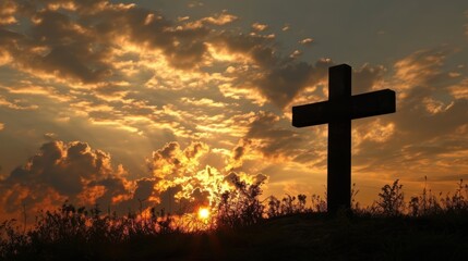 Wall Mural - silhouette of a cross on the background of a bright sunset