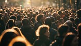 a crowd of people in warm jackets from behind, the sun is shining. blur, defocus, soft focus. concept of a big city, crowds, rallies, traffic jams, rush hour, diseases, coronavirus, distance