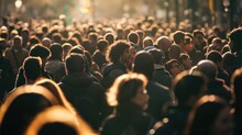 A Crowd Of People In Warm Jackets From Behind, The Sun Is Shining. Blur, Defocus, Soft Focus. Concept Of A Big City, Crowds, Rallies, Traffic Jams, Rush Hour, Diseases, Coronavirus, Distance