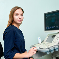 Wall Mural - Doctor doing ultrasound examinationof patient in clinic