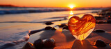 Fototapeta Na sufit - Heart shaped amber on sand on the beach at sunset