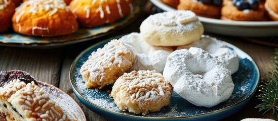 Wall Mural - Greek holiday treats include vasilopita, melomakarona, and kourabiedes.