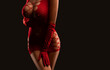 © Dimid - Beautiful female body with big breasts, red sexy underwear on a black background. Sexy body, close up nudity