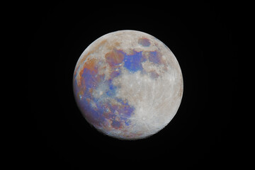 Wall Mural - color mineral super moon glowing against black sky dark background