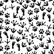 Seamless pattern with footprints of animals on white background. animal footprints. Paw seamless pattern. Cute background for pets dog or cat