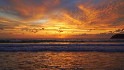 Wall Mural - .sea waves seamless loop on the beach at beautiful sunset..seascape view of beach sea in summer day romantic sky at sunset..smooth waves in beautiful sky at sweet sunset. .abstract nature background..
