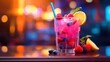 © Maria Starus - A glass of fruity drink with a blue straw