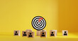 target board and arrow which print screen to wooden cube block. Business achievement goal and objective target concept.