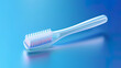 A toothbrush with a highlighted toothpaste on its bristles