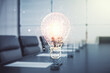 © Pixels Hunter - Abstract virtual light bulb hologram on a modern boardroom background, idea concept. Multiexposure