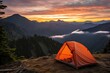 Dusk Adventure: Peachy-Orange Tent In A Scenic Landscape For Backpacking