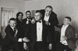 © Vasil - A young groom and his funny friends pose for the camera. A group of young people hug the groom and cheerfully congratulate him. Happy friends. Friends in the room. Wedding day. Black and white photo.