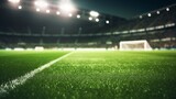 Fototapeta Sport - Green grass macro in sports arena  with lights background. Close up of  soccer field lines. Background soccer lawn grass football stadium ground view.