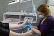 Professional relaxing foot massage performed by a podiatrist.