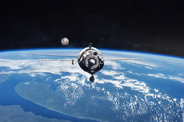 Wall Mural - blue planet earth with spacecraft launched into outer space. elements of this image furnished by nas