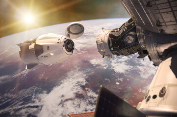 Wall Mural - cargo spacecraft in low-earth orbit with sunlight. elements of this image furnished by nasa.