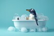 Penguin lies in a bath filled with ice cubes, the concept of cooling and refreshment in hot weather.