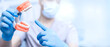 © Parilov - Dentistry clinic banner with copy space. Dentist using holding jaw model for rules of oral and dental care