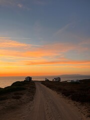 Wall Mural - Ocean and purple sky at the ocean bay, orange ocean horizon