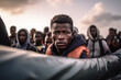 Migrant vessel in Mediterranean Sea. Migrants aboard an inflatable vessel in sea. European migrant crisis. Illegal immigration on boat on sea border. Europe and Africa tackle migration. Refugees
