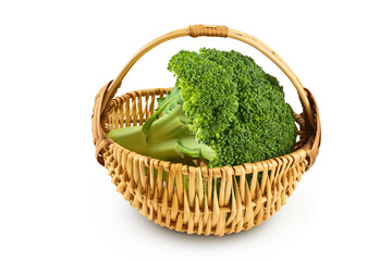 Wall Mural - fresh broccoli in wicker basket isolated on white background close-up with full depth of field