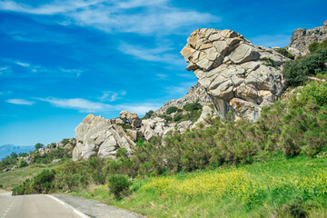 Poster - Karst landscape of Torcal de Antequera in Andalusia. Large valley with Mediterranean vegetation surrounded by vertical limestone rock walls